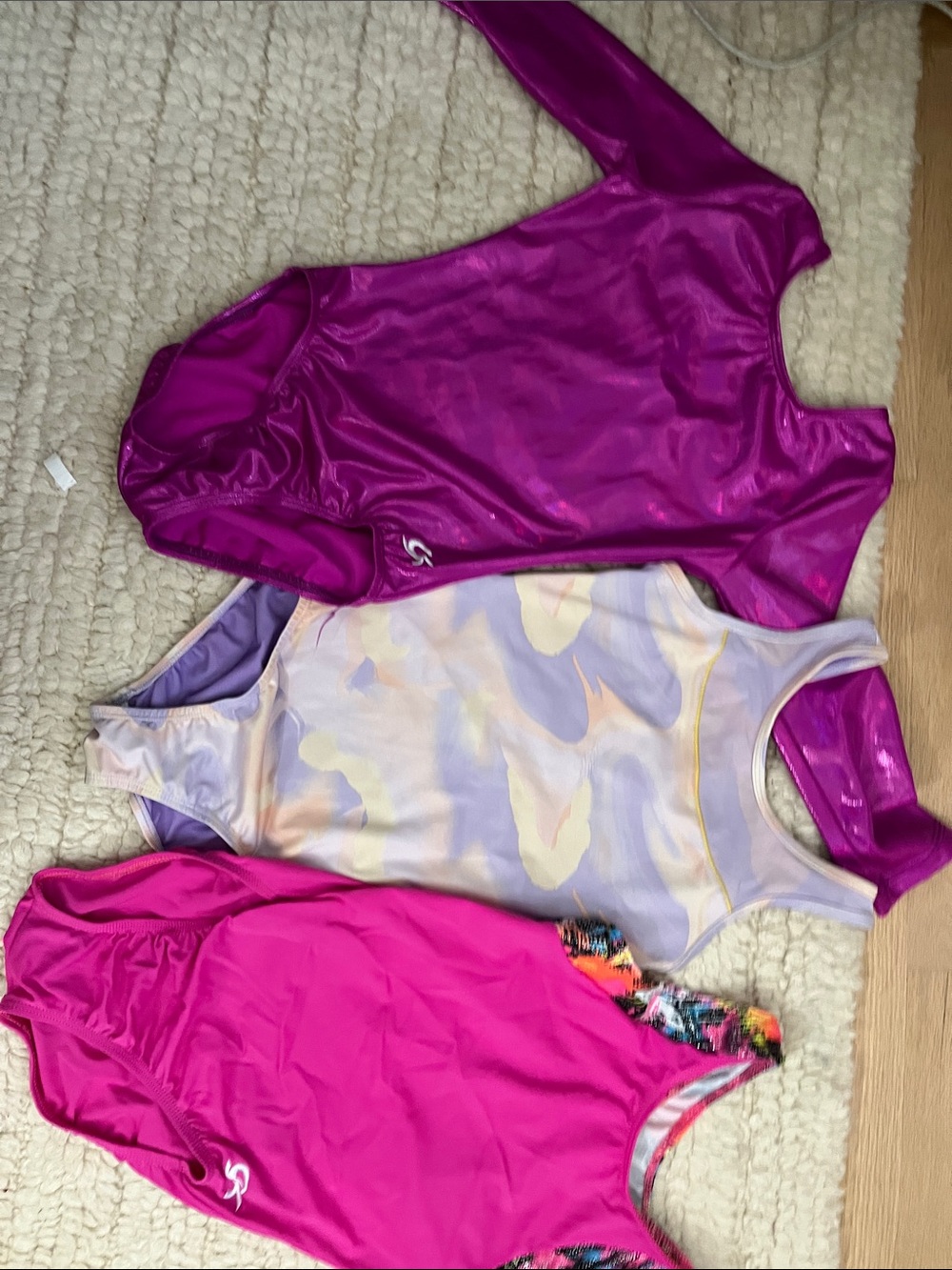 Size 10 Girls gymnastics leotards pink and purple bundle